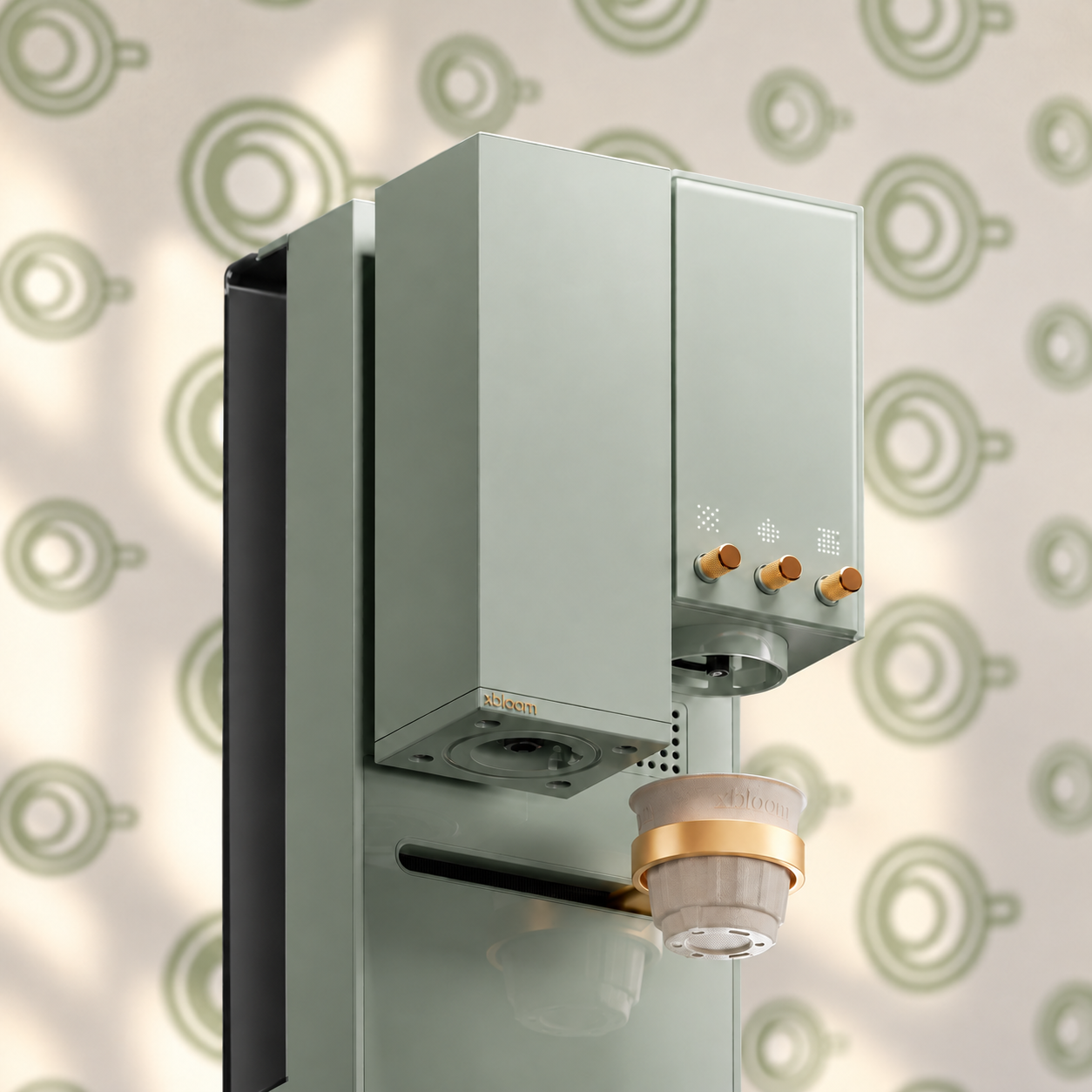 xBloom Studio in Sage Green with gold knobs against Le Brulée cup-pattern wallpaper