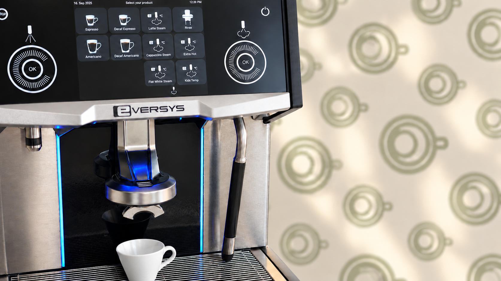 Eversys Cameo with a white espresso cup against Le Brulée light-green cup-pattern wallpaper