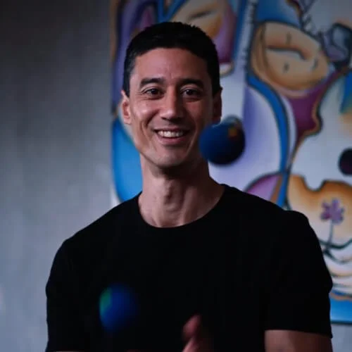Daniel juggling two balls, with text 'Fast work'