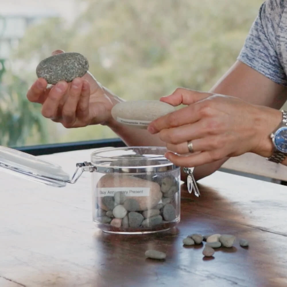 Adding rocks to a jar