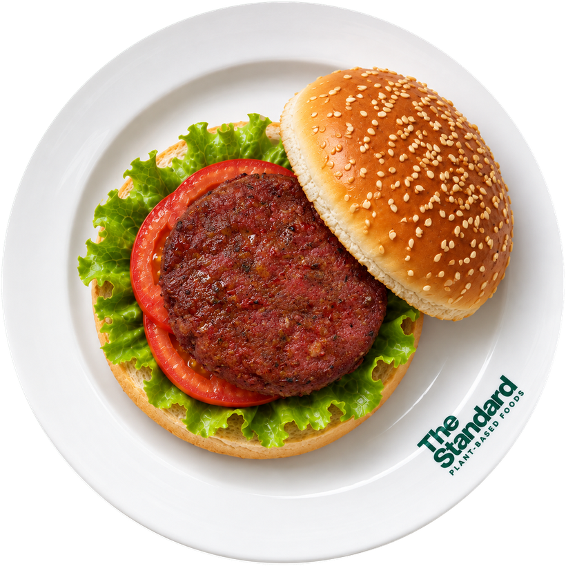 Tabakta bitki bazlı burger, marul ve domatesle