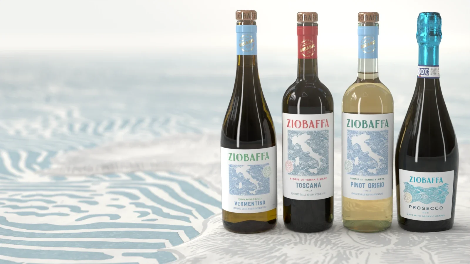 The four ZIOBAFFA wines — Vermentino, Toscana, Pinot Grigio and Prosecco — standing on the wave print of the label