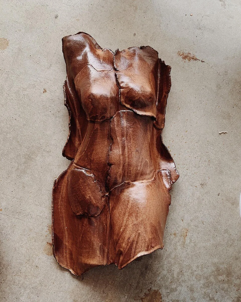 Fired ceramic sculpture made by a kiln firing student