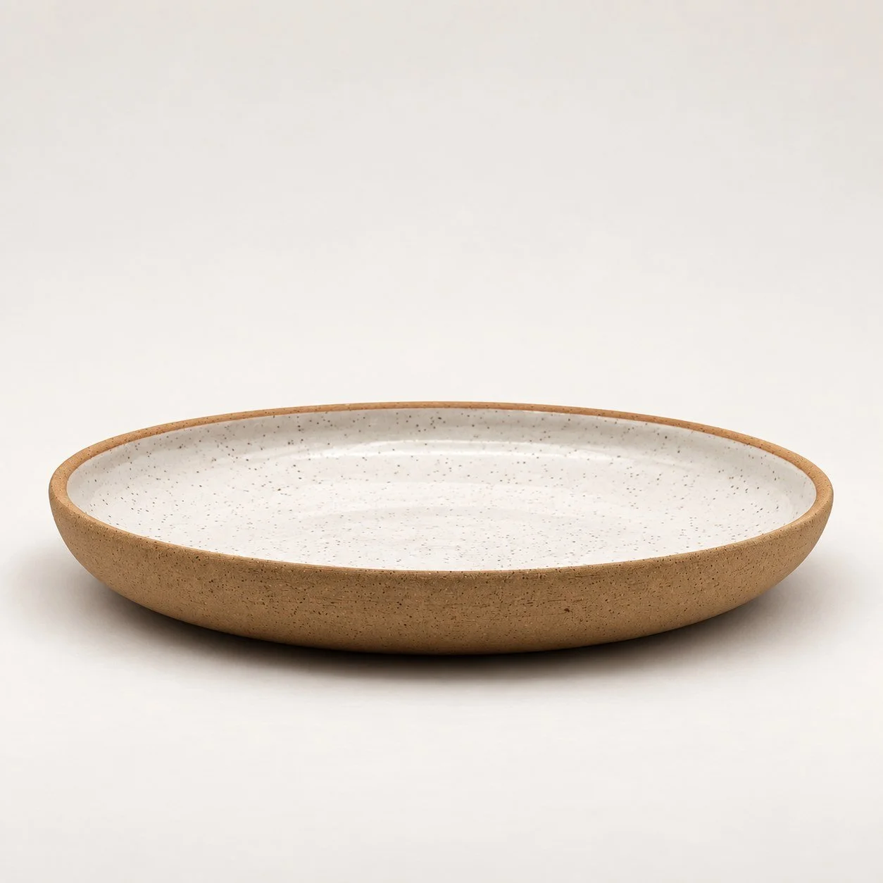 White on speckled buff · Gloss