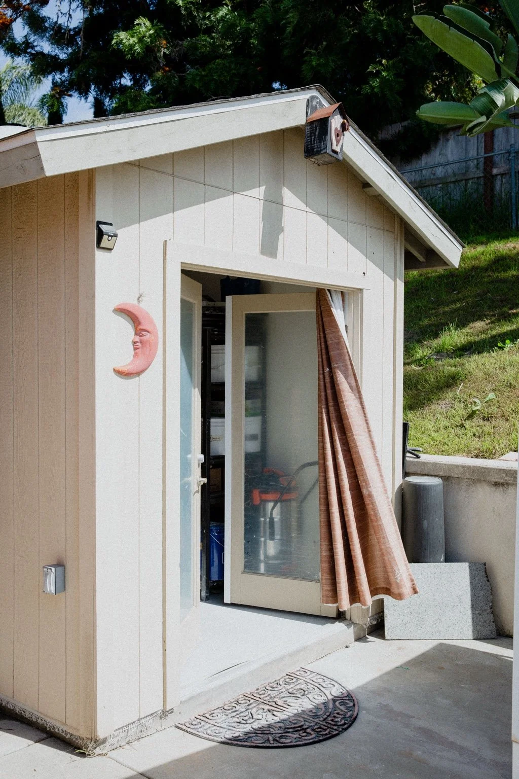 The open doorway of John’s pottery studio in Vista