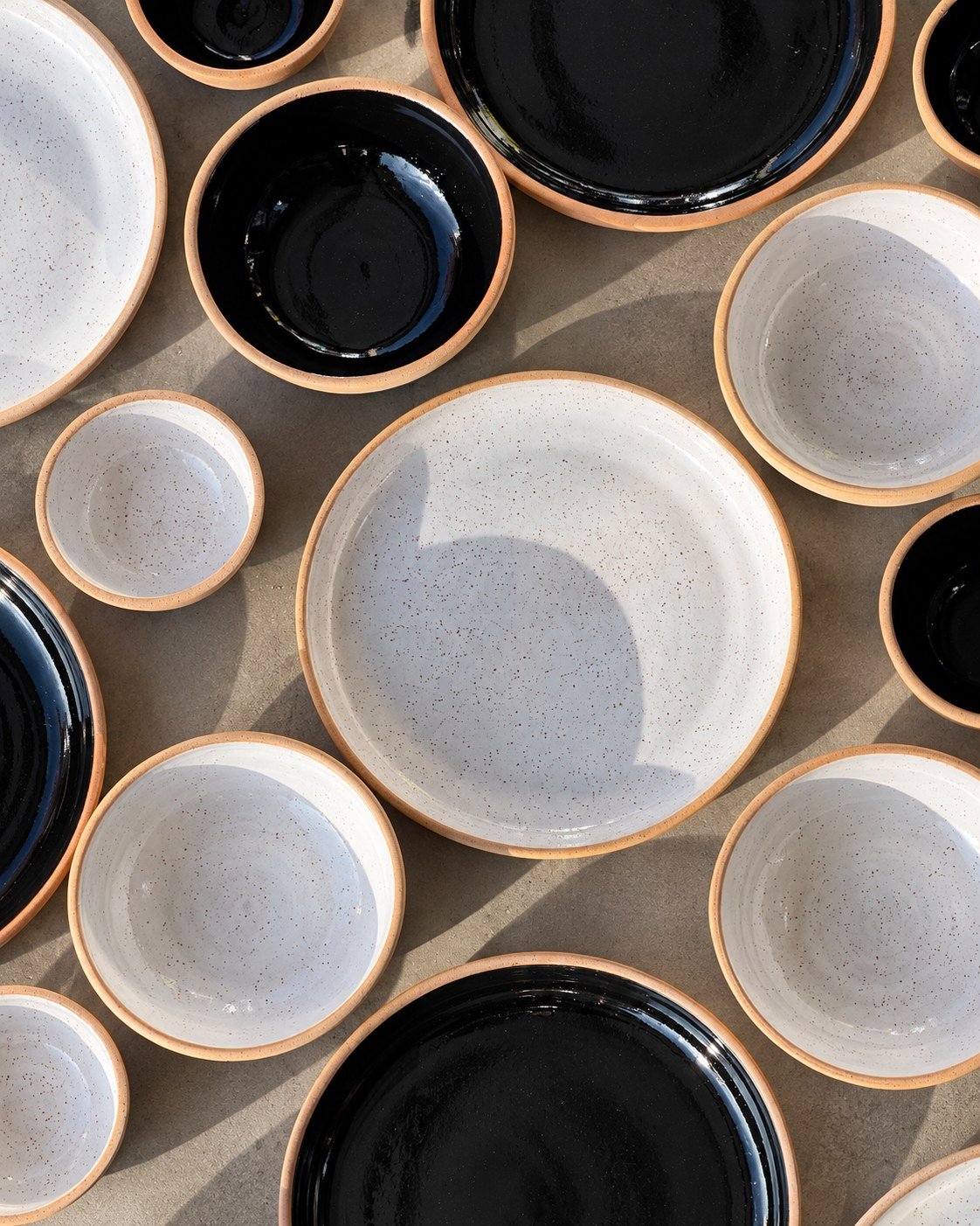 Black and white on exposed clay · Gloss