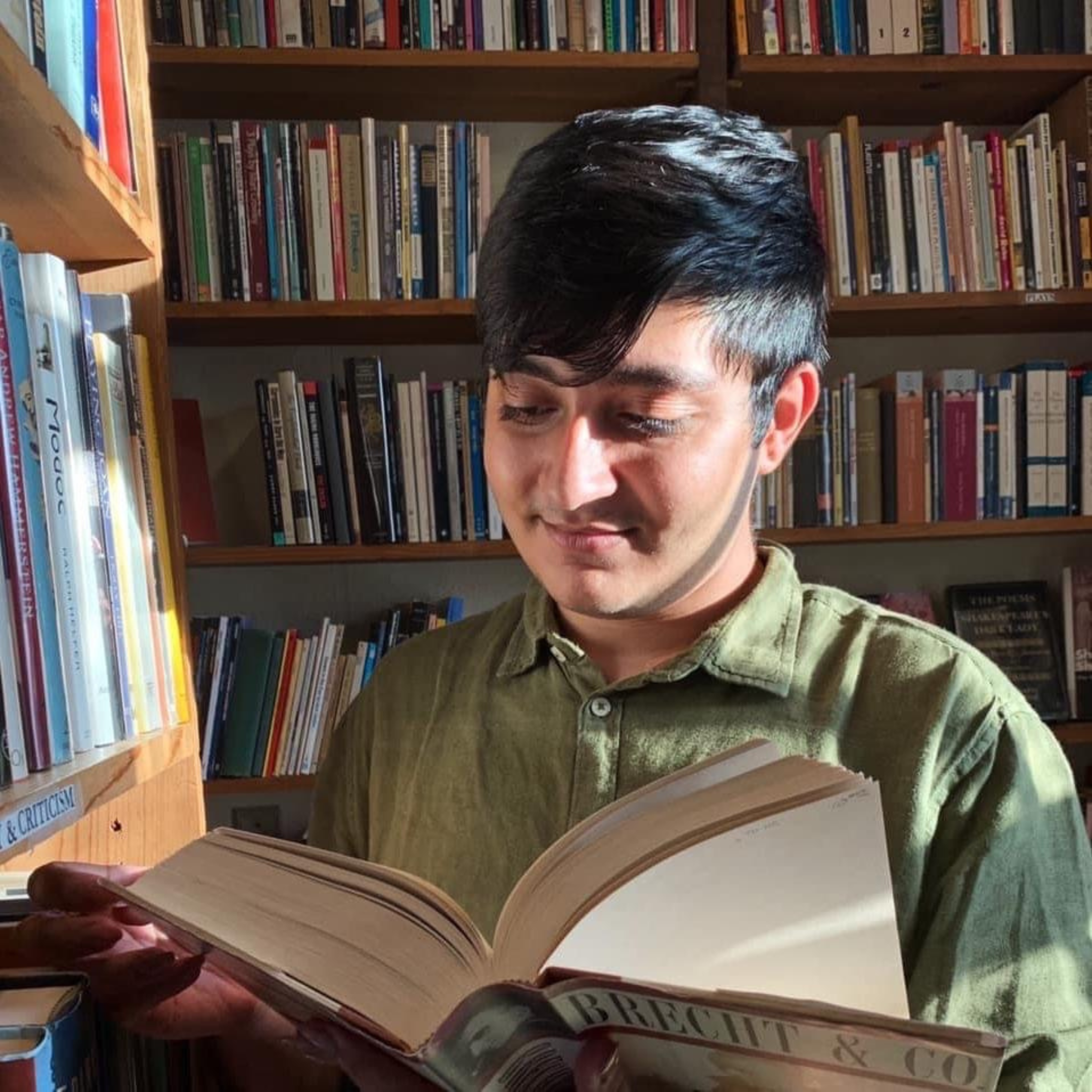 Creator reading book
