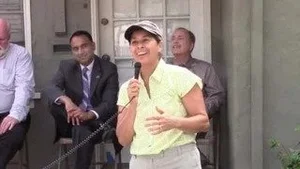 Elizabeth Sarmiento speaking at the October 2015 launch event with local officials