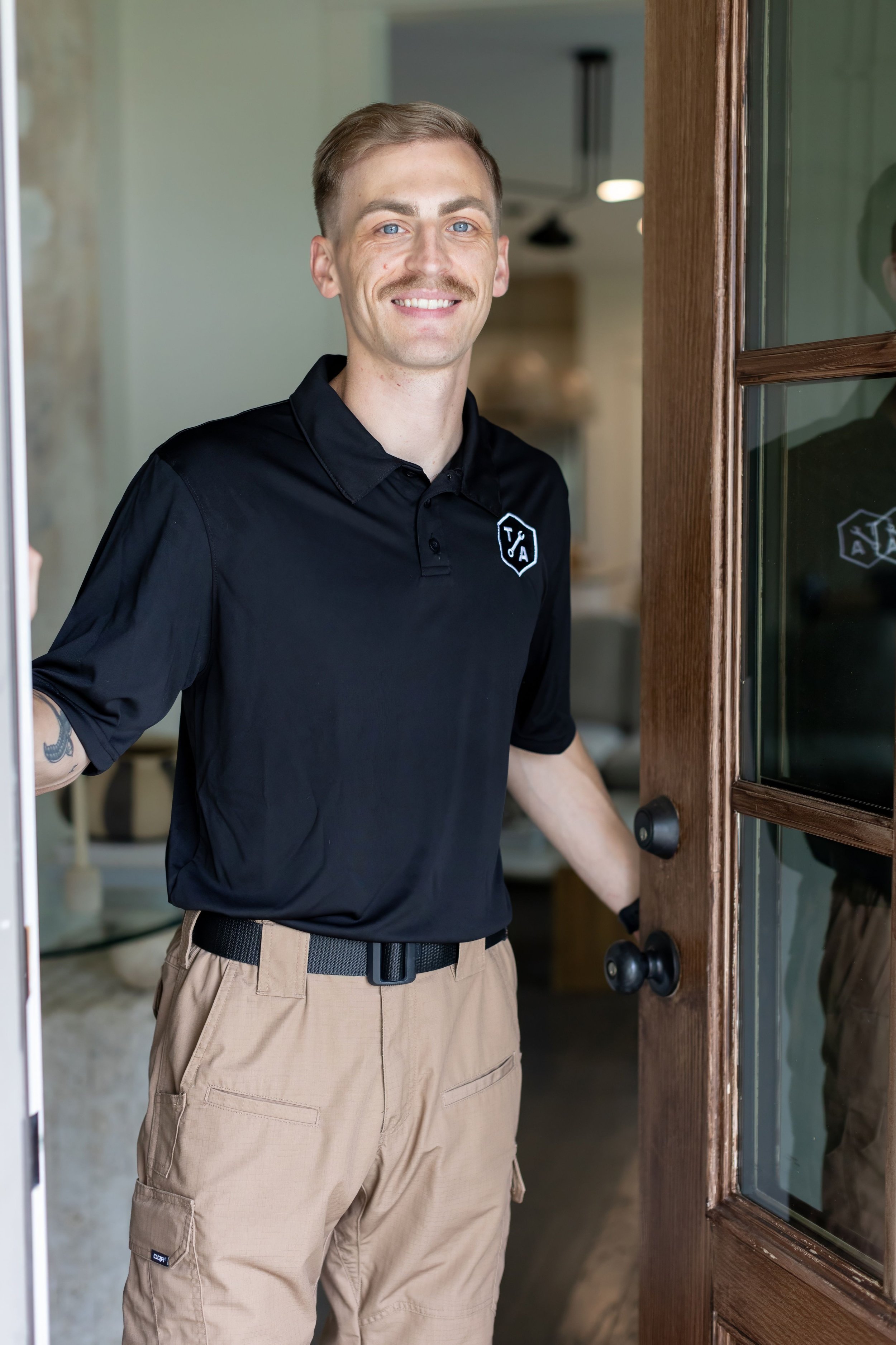 Aaron Tucker of Tucker Appliance Repair on a range hood repair service call in Greater Birmingham