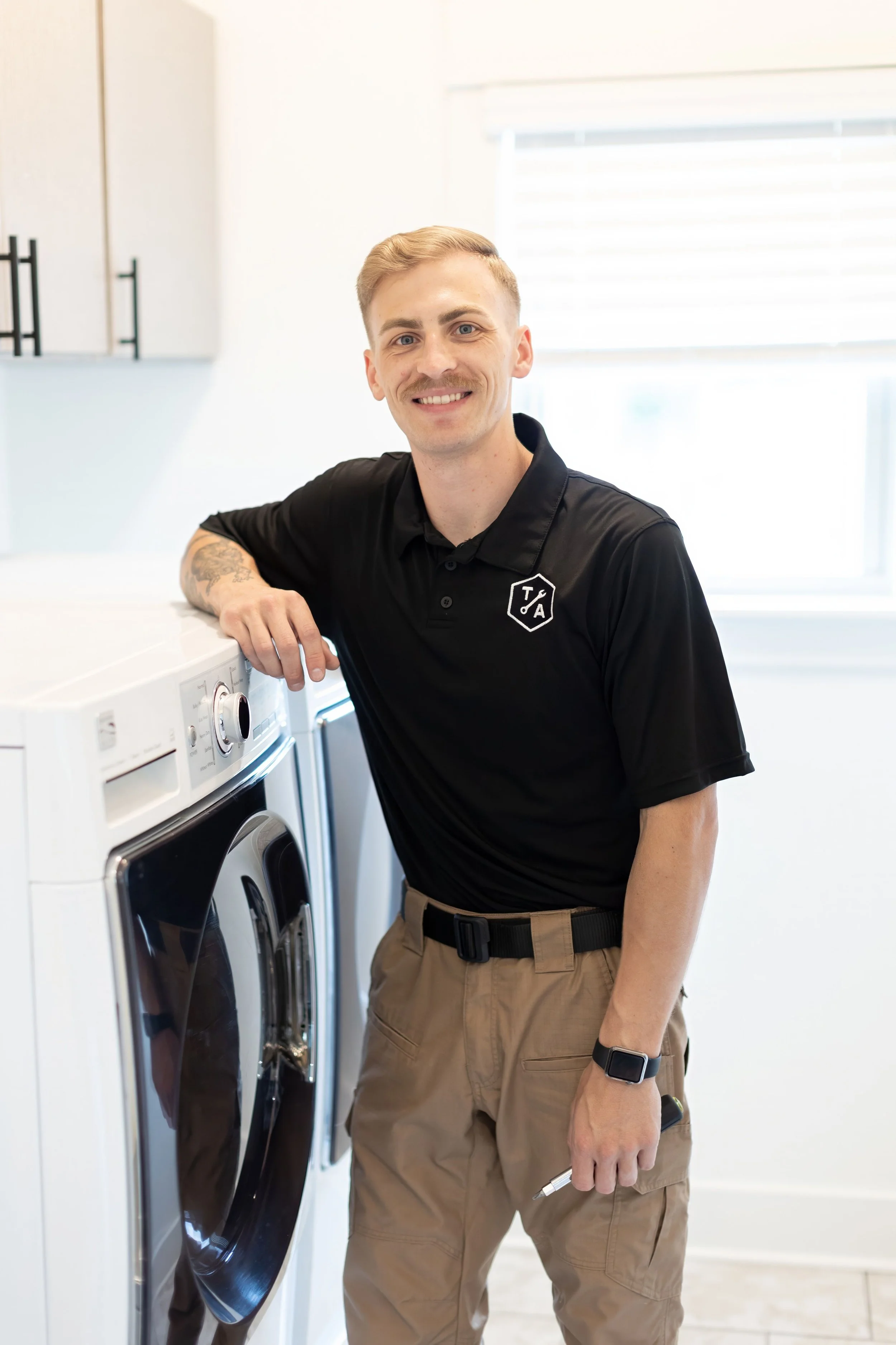 Aaron Tucker of Tucker Appliance Repair on a ice maker repair service call in Greater Birmingham