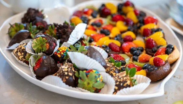 Chocolate covered strawberries and fresh fruit from local partners
