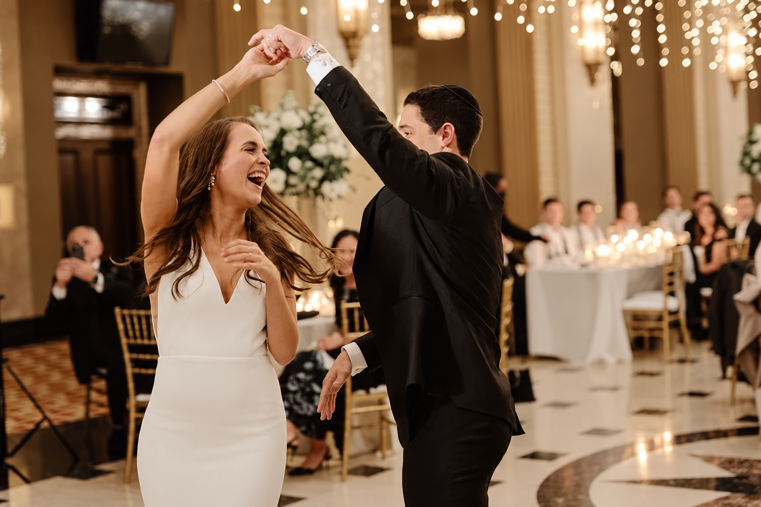 Newlyweds dancing at their reception