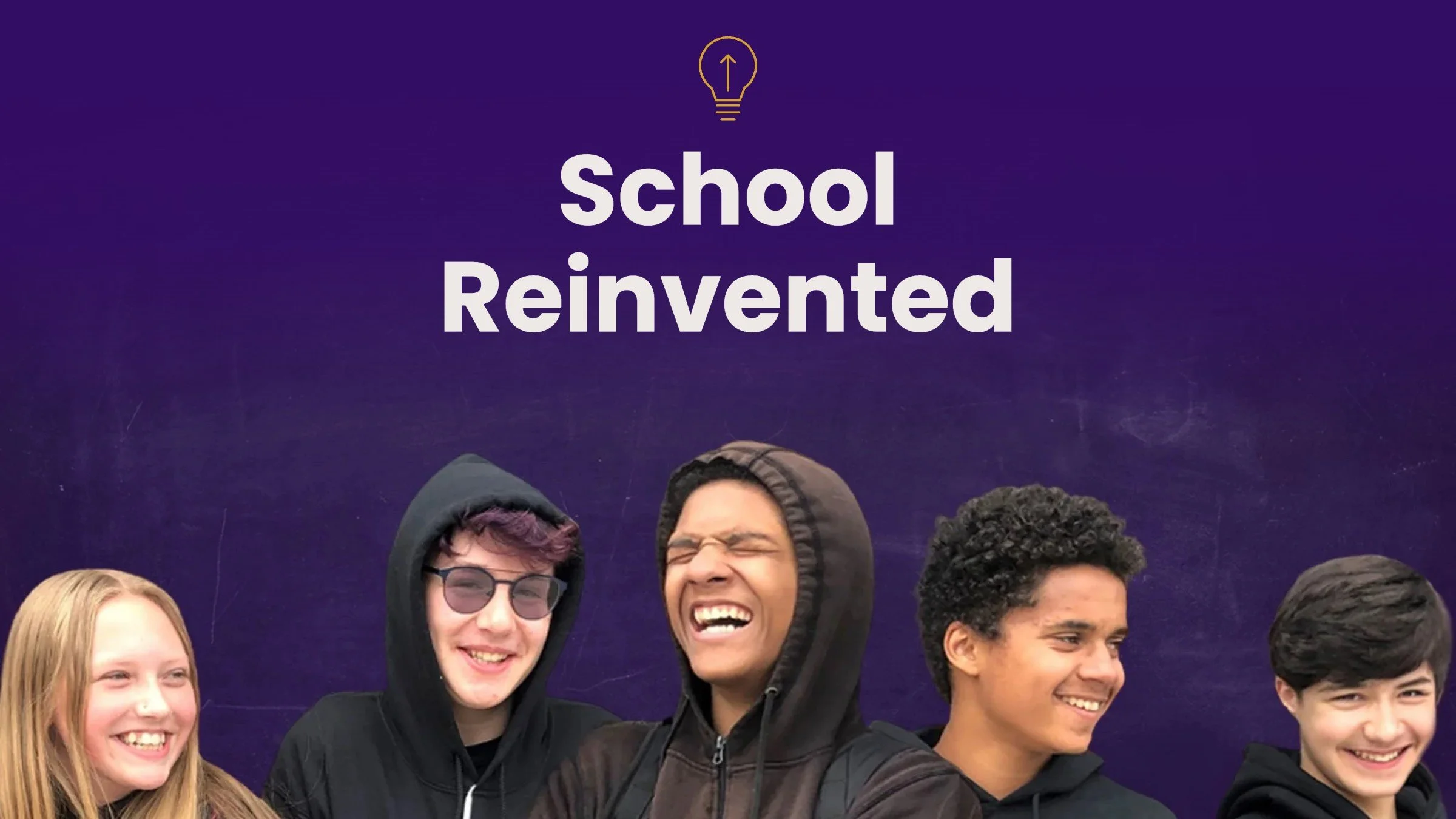 School Reinvented. Open School students smiling together in front of a chalkboard.