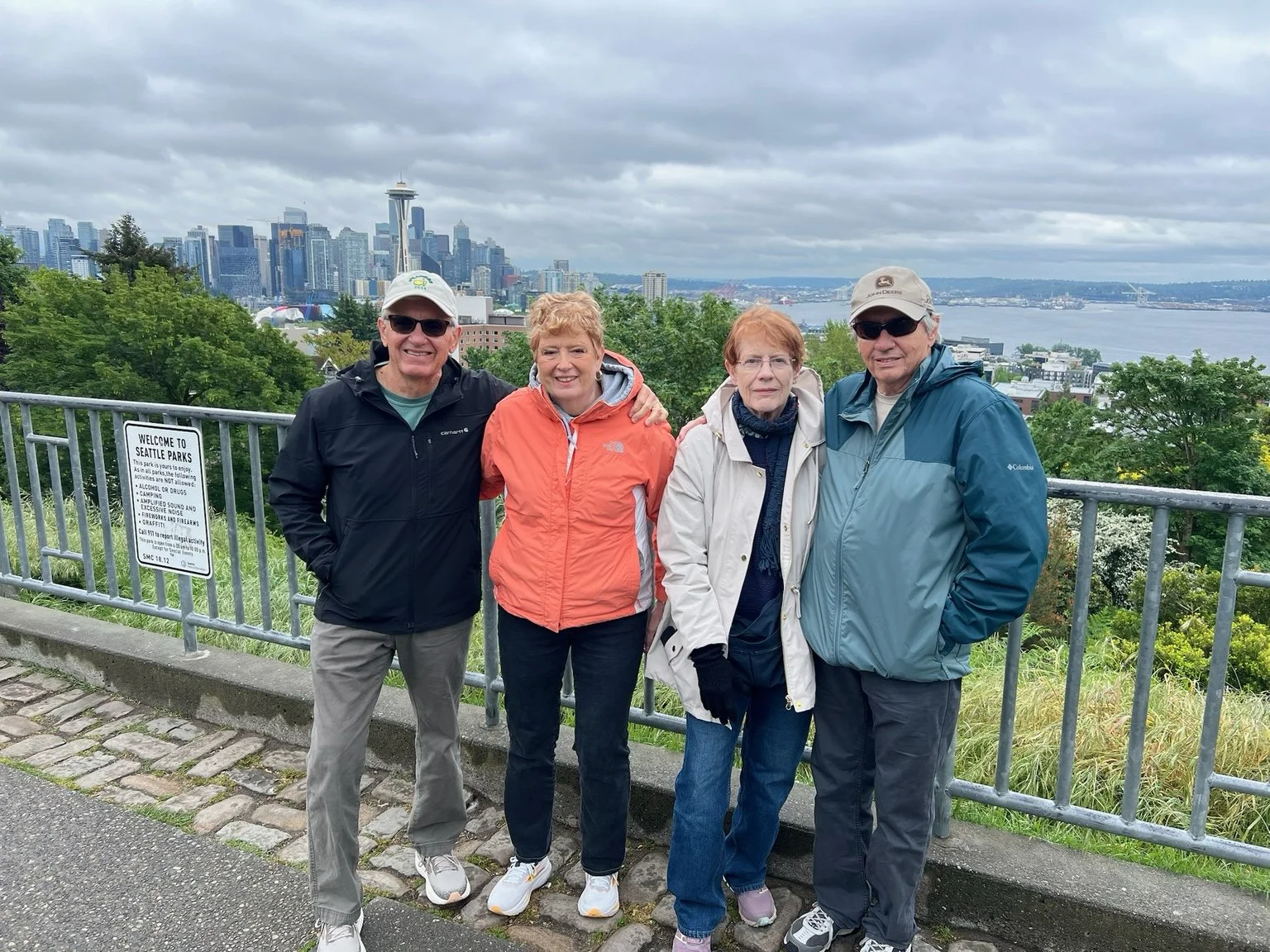 Four Cascade guests taking in the Seattle skyline