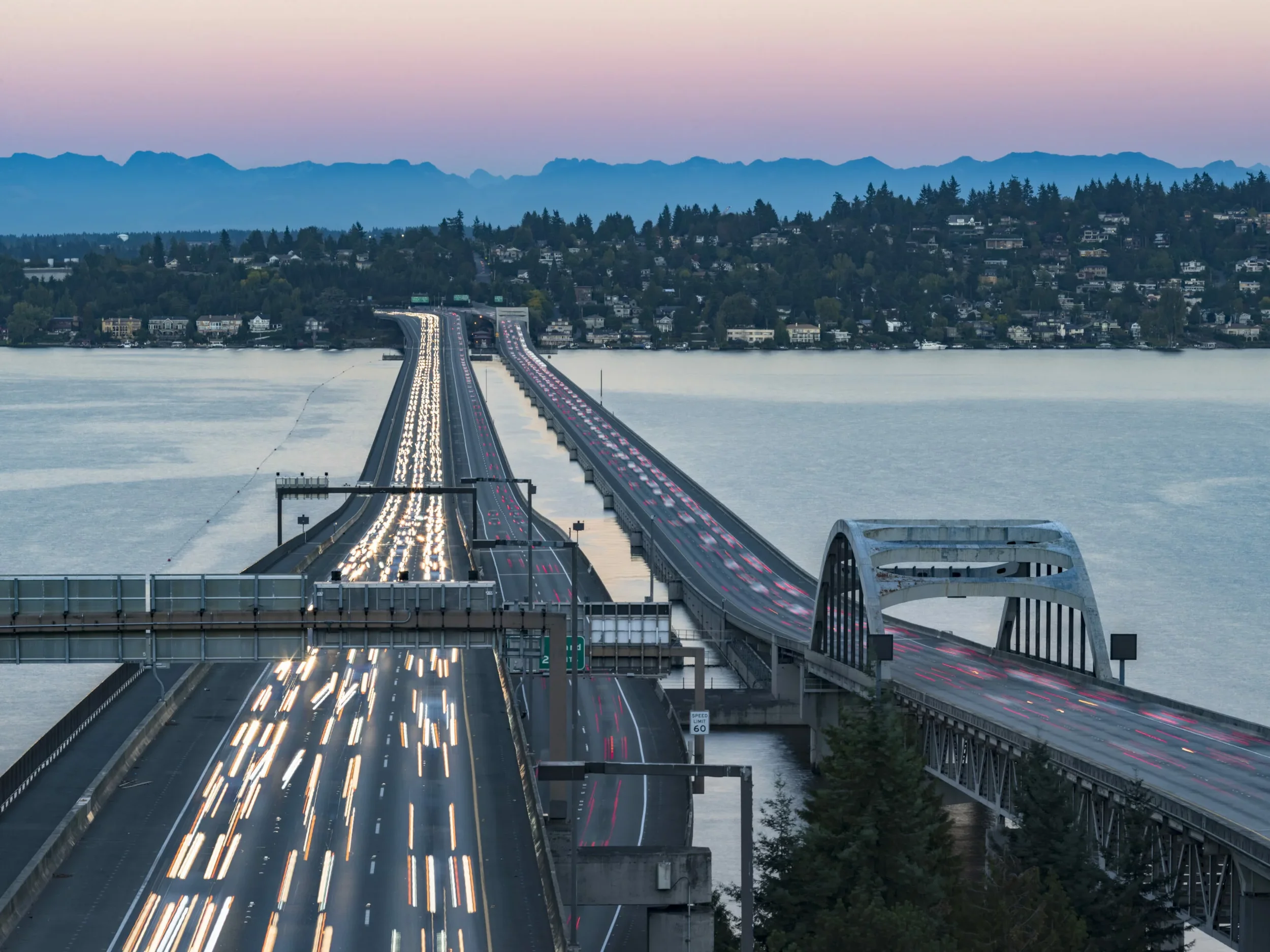 Roadway and rail tracks crossing Lake Washington on a floating bridge
