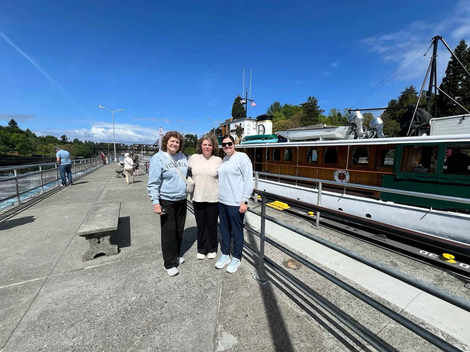 Guests beside the working waterway at the Ballard Locks