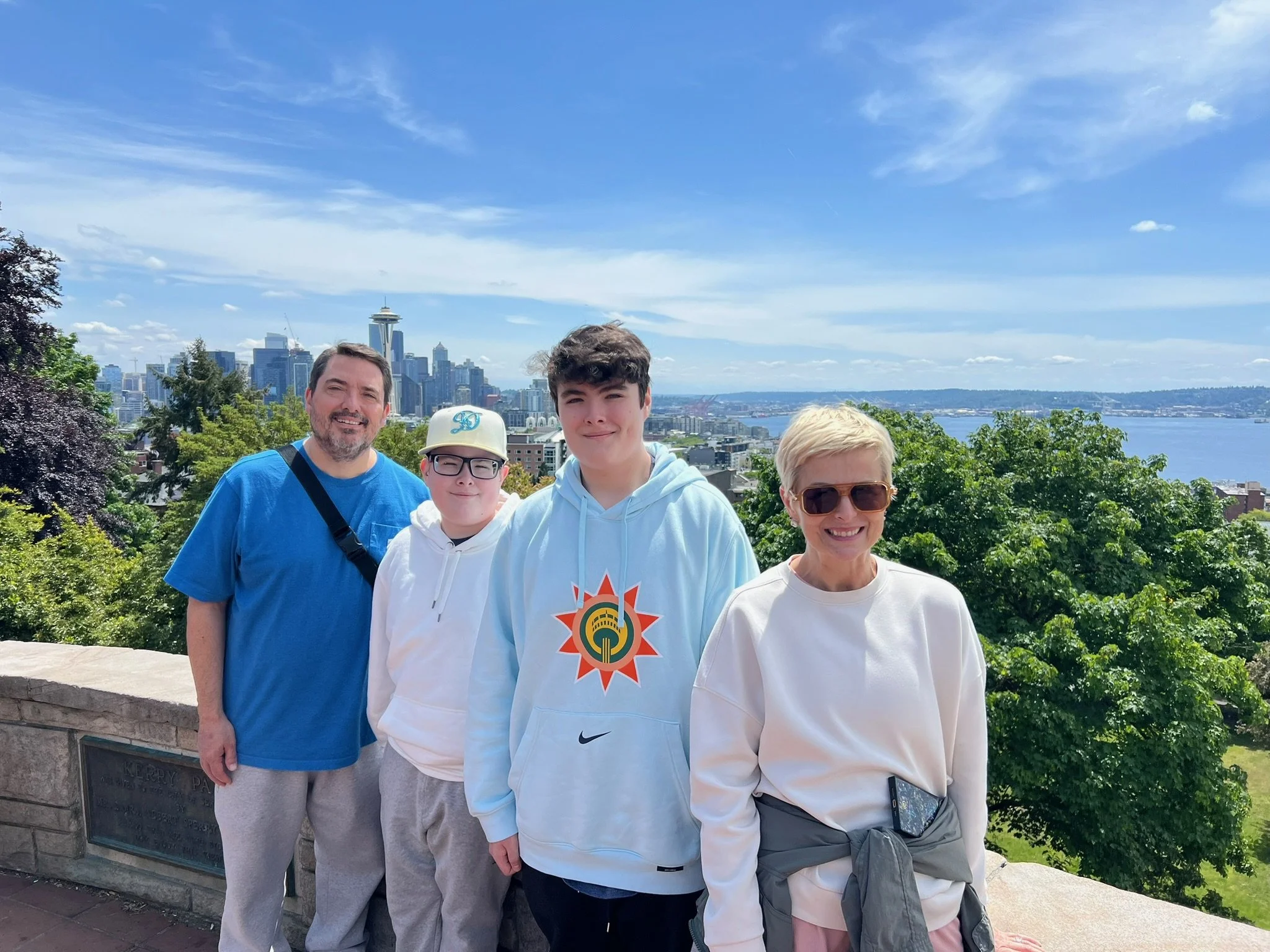 A family enjoying the Seattle skyline at Kerry Park