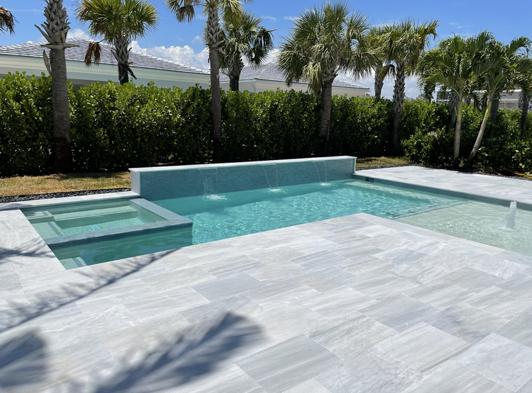Pool and deck project by Oasis Pools and Pavers, Palm Beach County