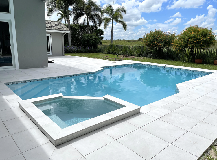 Pool and deck project by Oasis Pools and Pavers, Palm Beach County