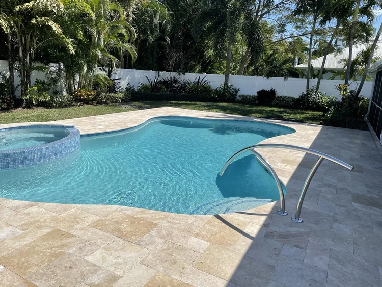 Pool and deck project by Oasis Pools and Pavers, Palm Beach County