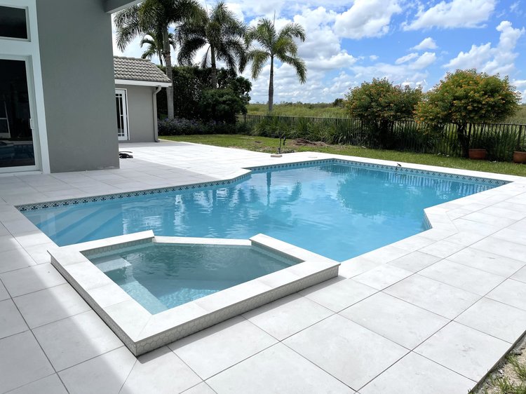 Pool and deck project by Oasis Pools and Pavers, Palm Beach County