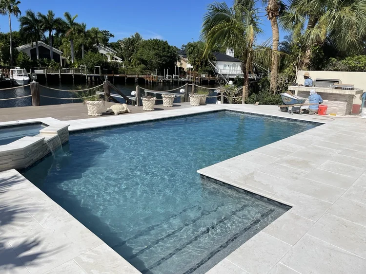 Pool and deck project by Oasis Pools and Pavers, Palm Beach County