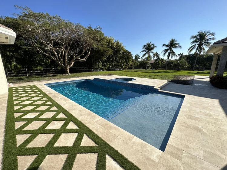 Pool and deck project by Oasis Pools and Pavers, Palm Beach County
