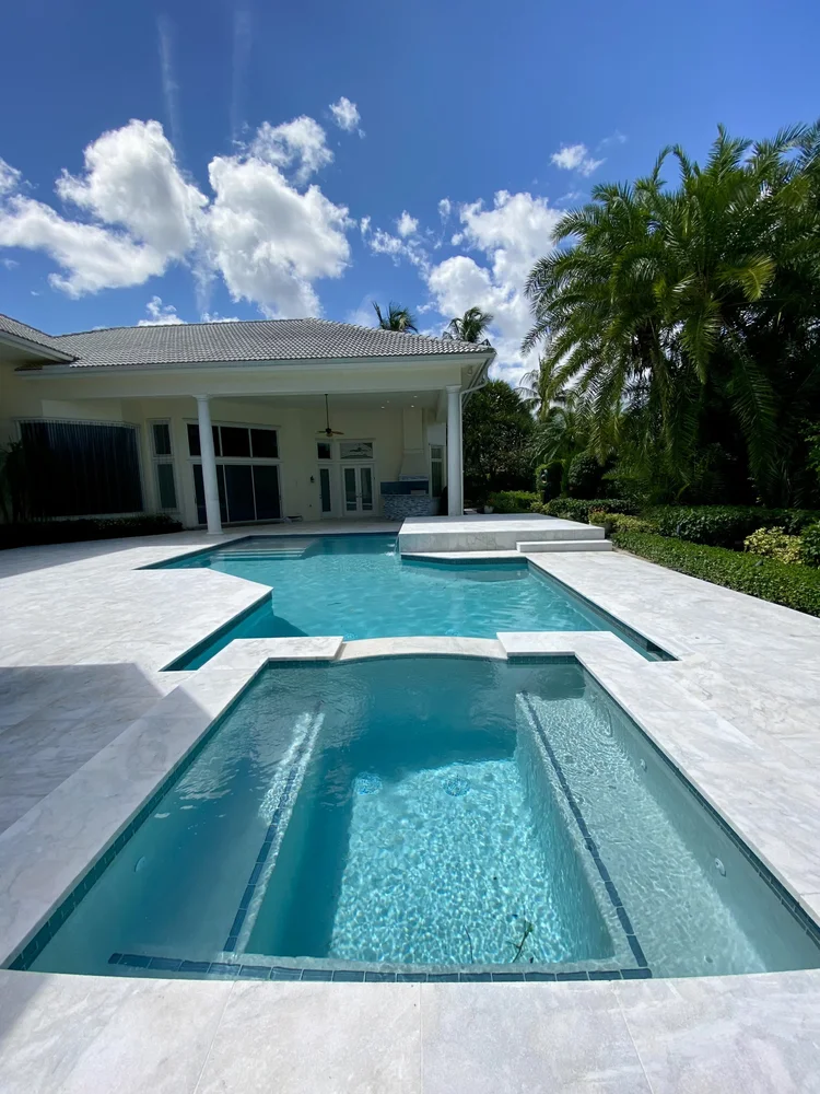 Pool and deck project by Oasis Pools and Pavers, Palm Beach County