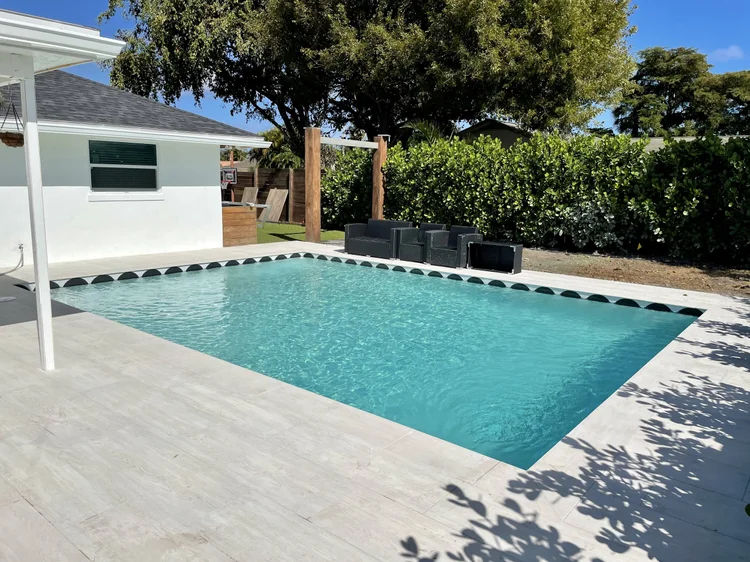 Pool and deck project by Oasis Pools and Pavers, Palm Beach County