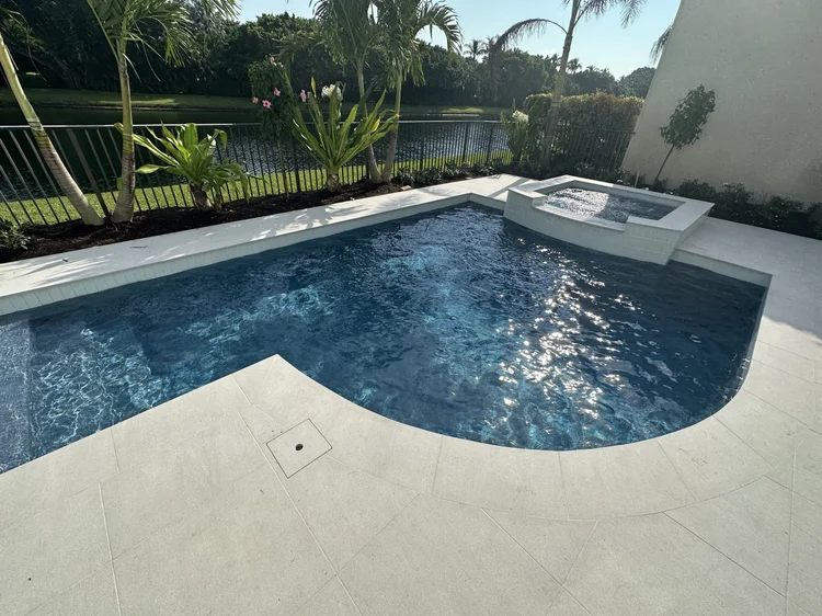 Pool and deck project by Oasis Pools and Pavers, Palm Beach County