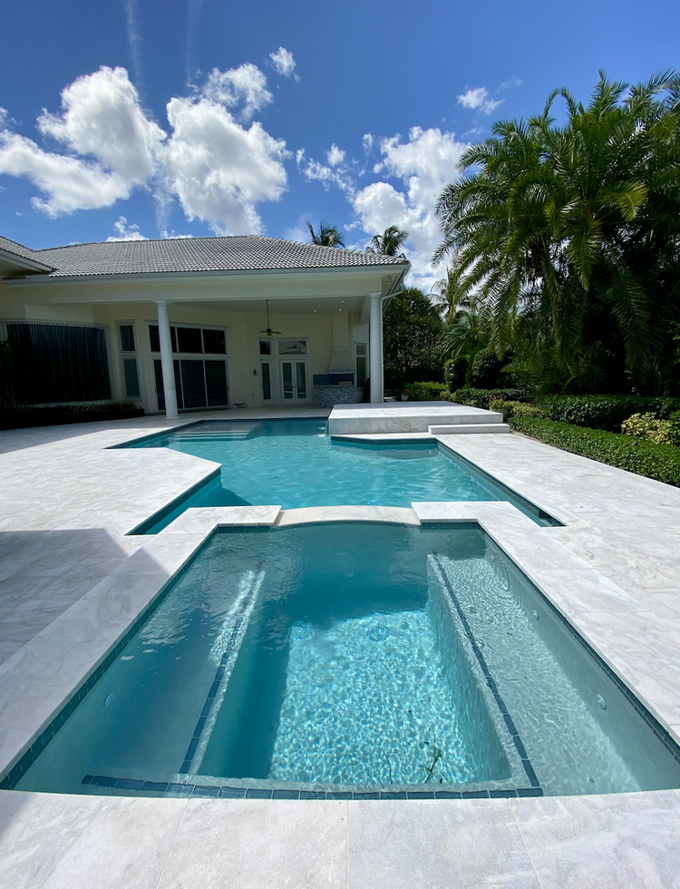 Pool and deck project by Oasis Pools and Pavers, Palm Beach County