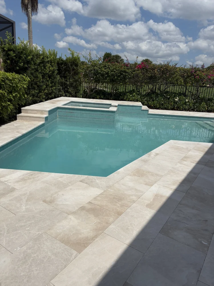 Pool and deck project by Oasis Pools and Pavers, Palm Beach County