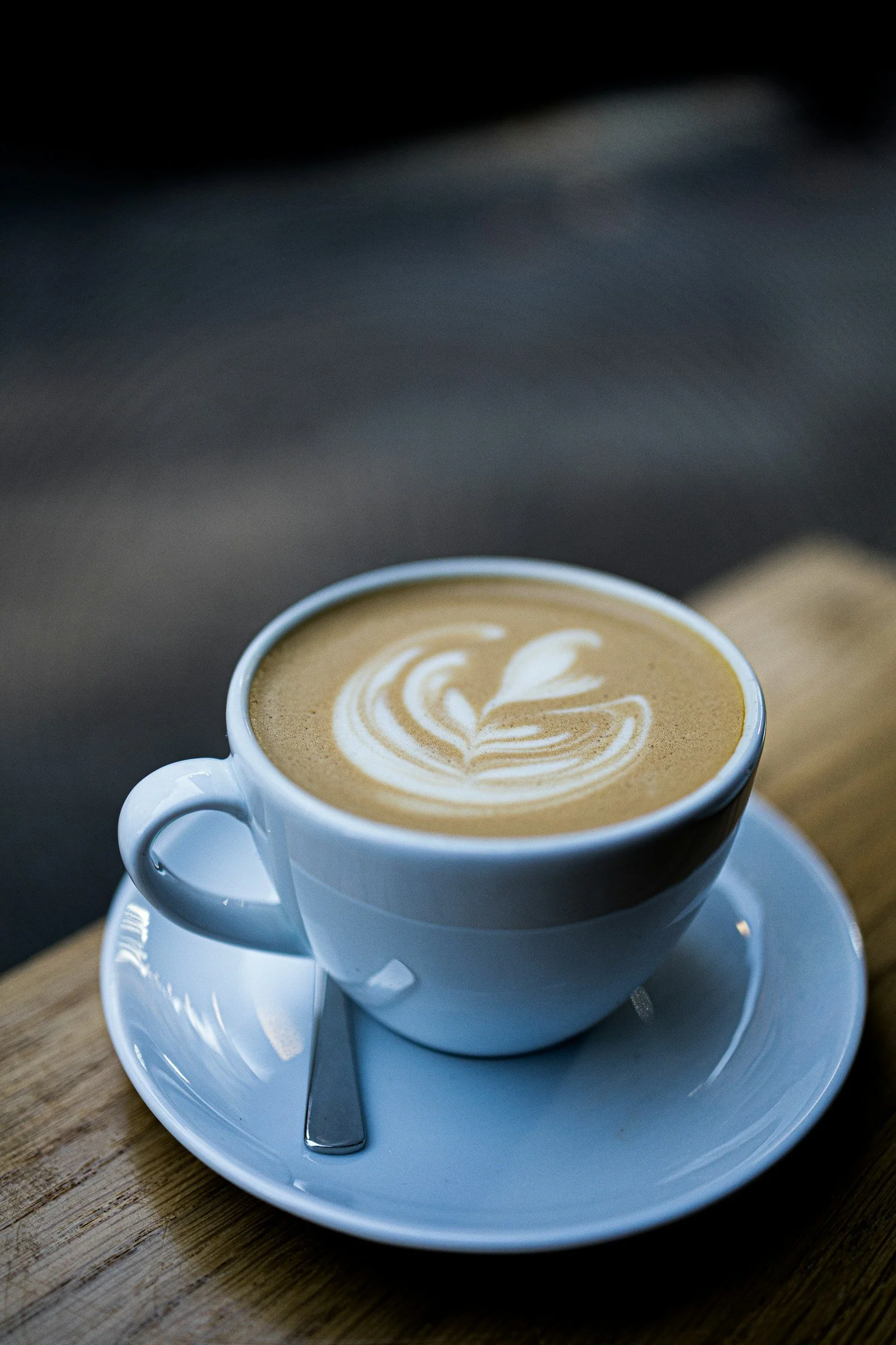 Hot latte in a ceramic cup, serving inspiration