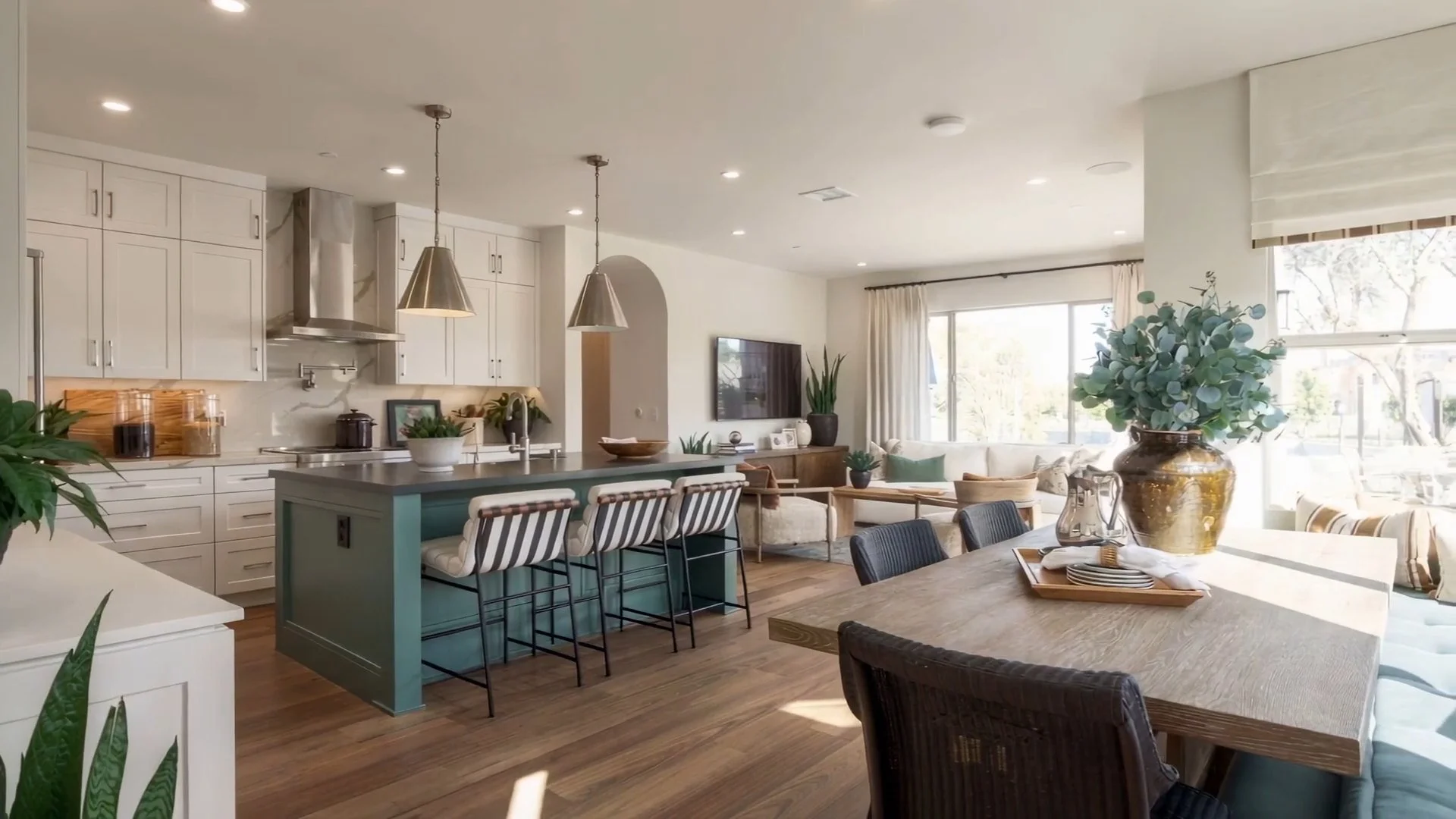 Kitchen with striped counter stools in an Irvine model home