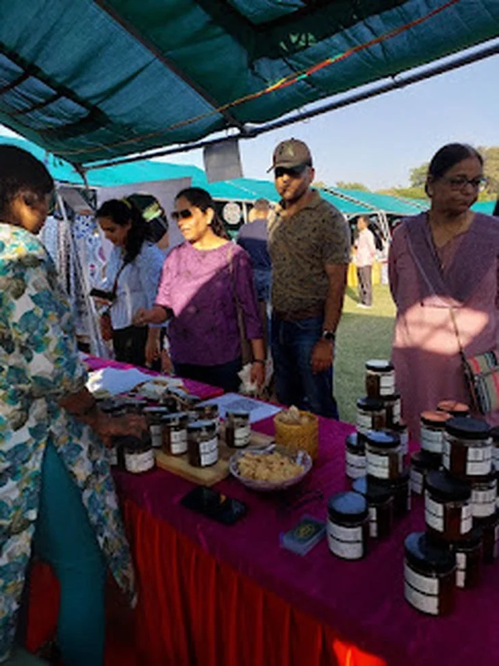 Customers tasting pickles at the Niwala stall