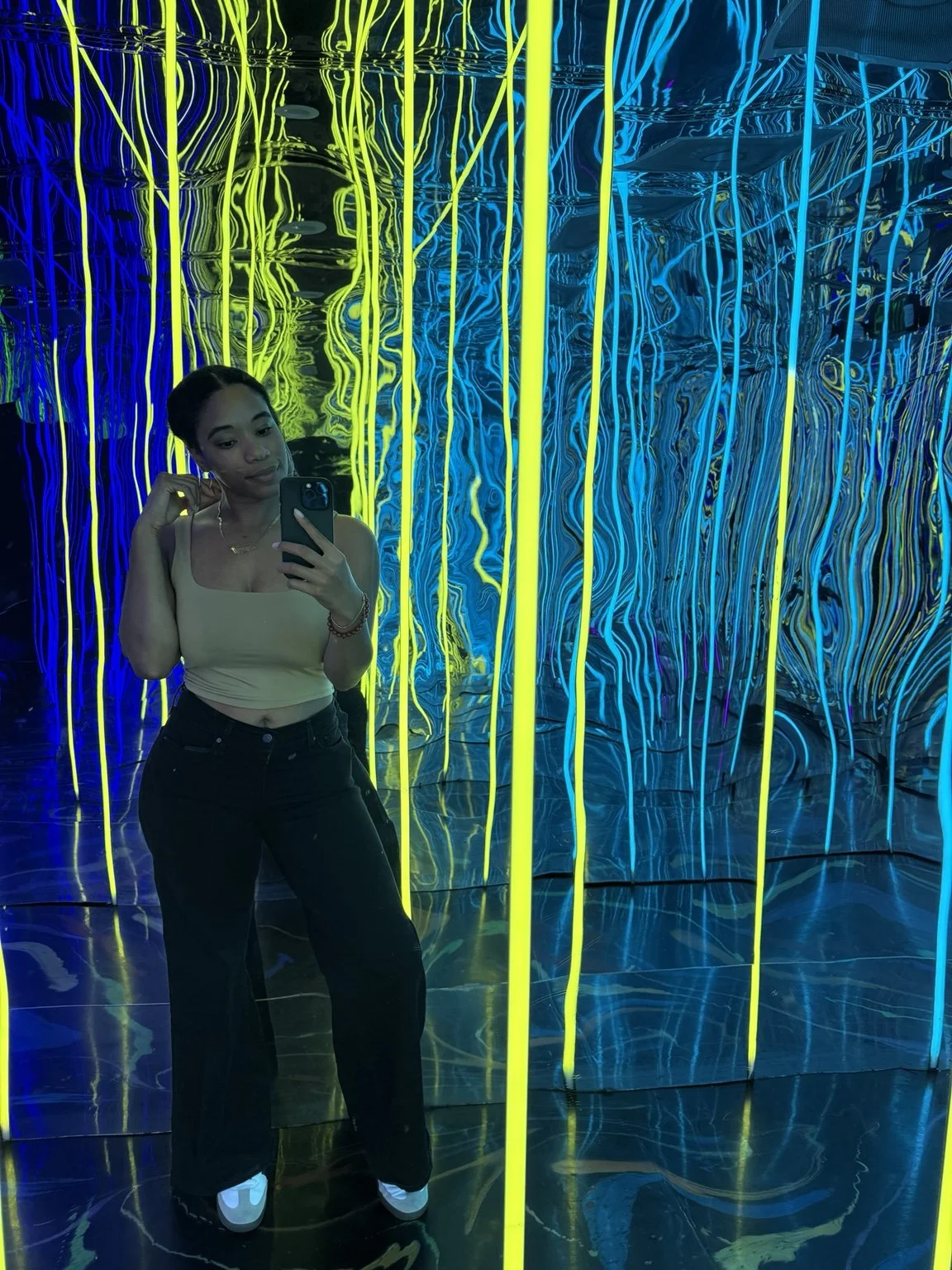 Ley exploring a colorful installation