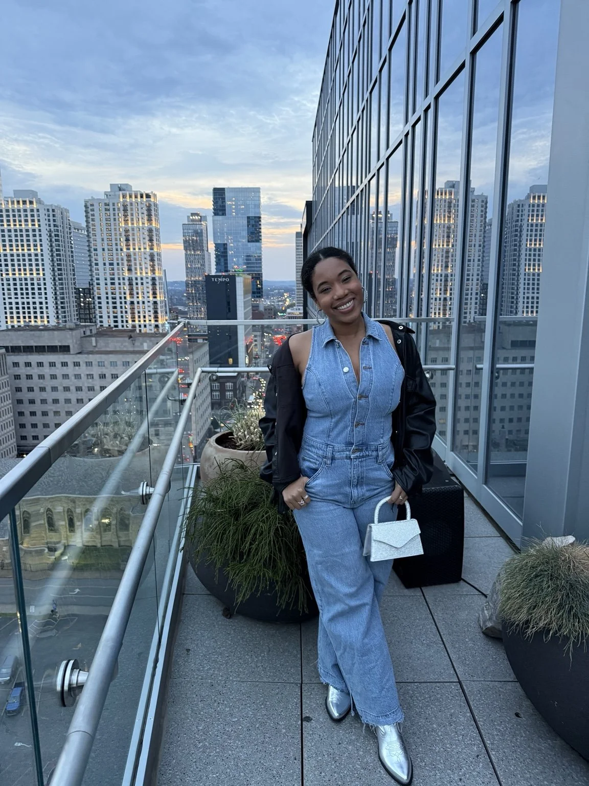 Ley on a rooftop in the city