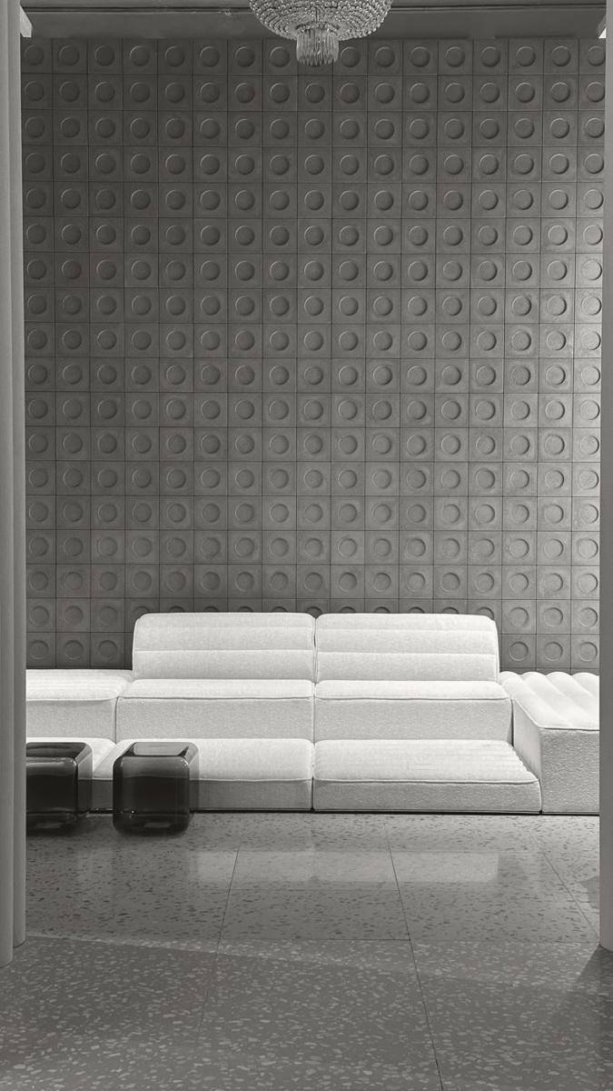 White sofa in a minimal lounge