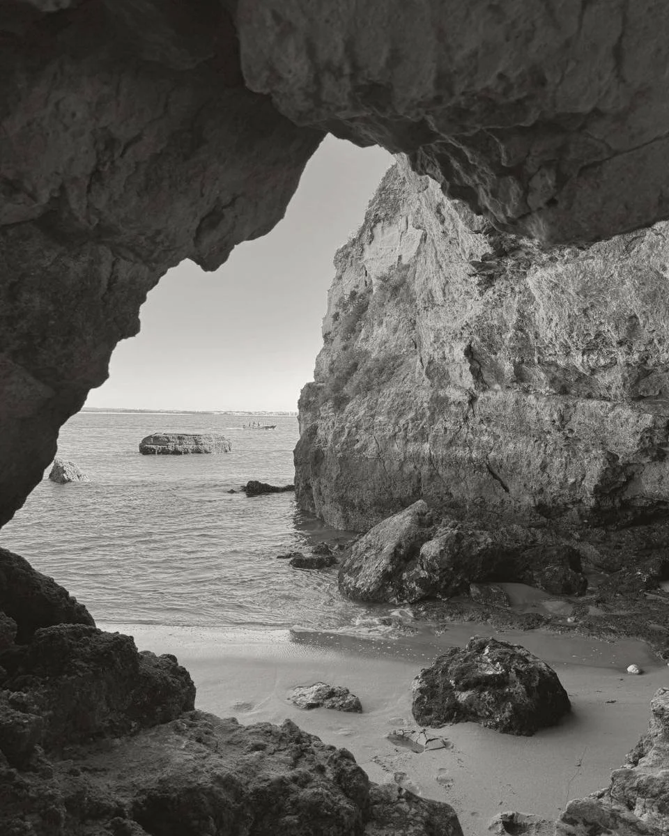 Sea cave opening onto a beach