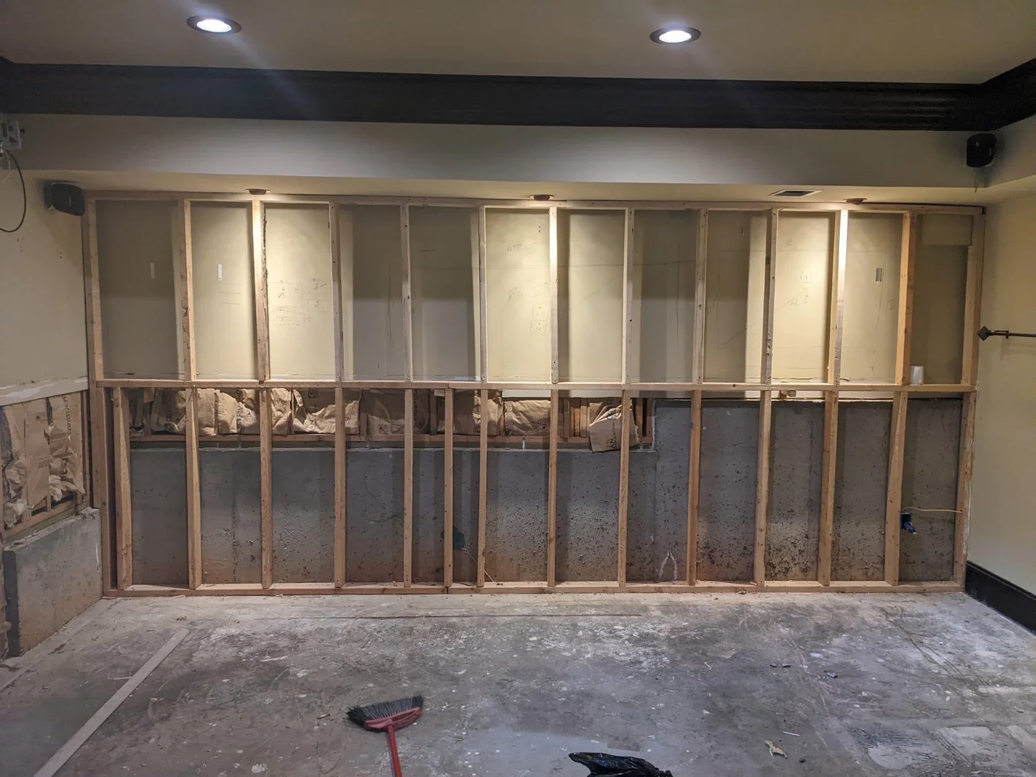 Basement accent wall before