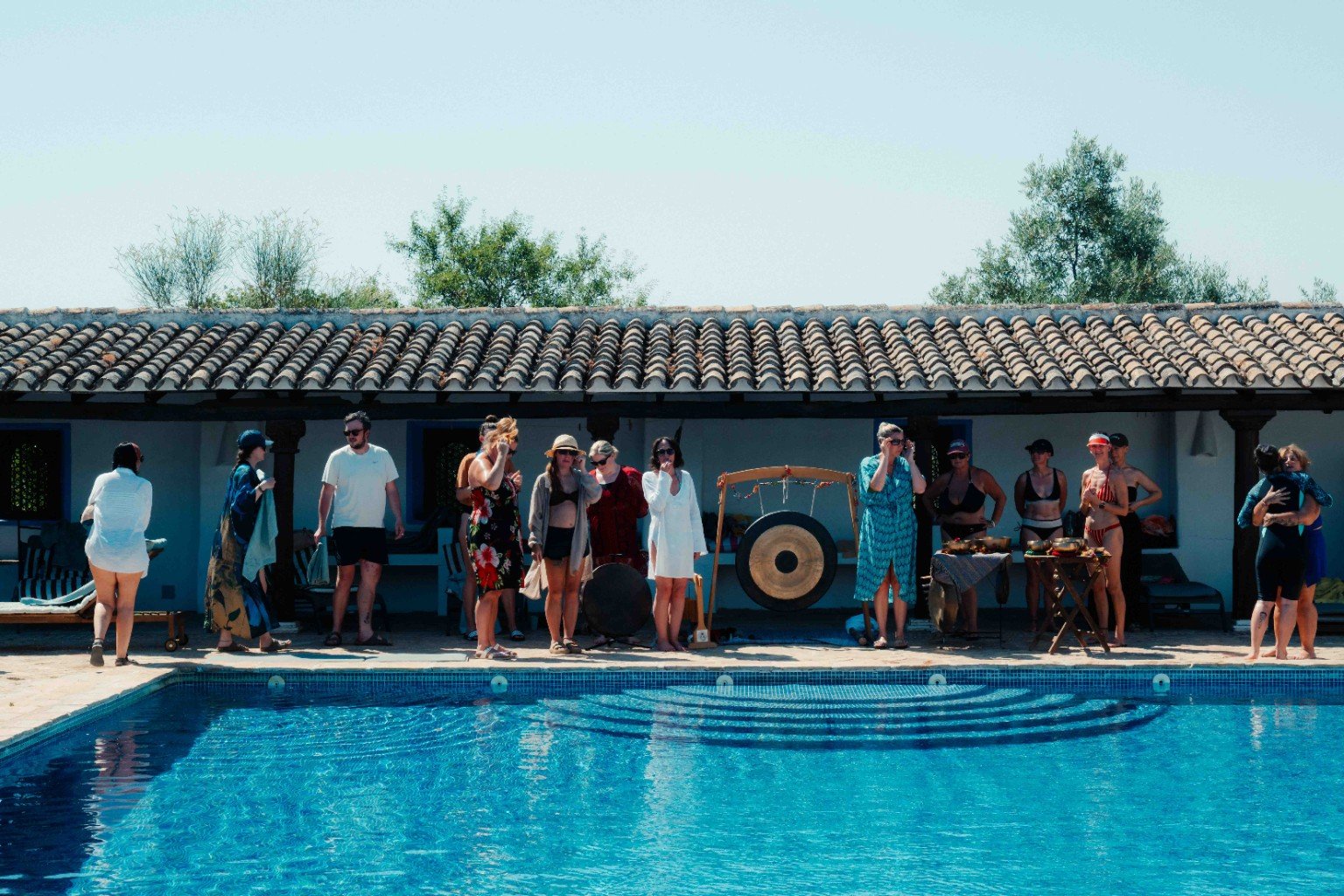 Outdoor group sound experience beside the pool