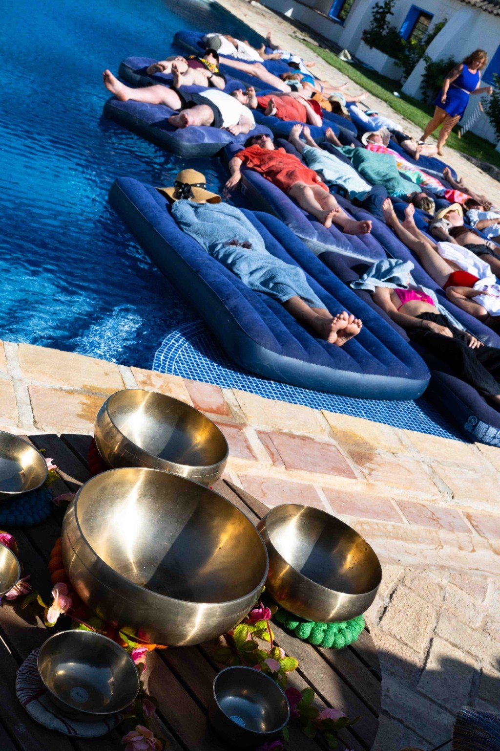 Floating group soundbath in the pool