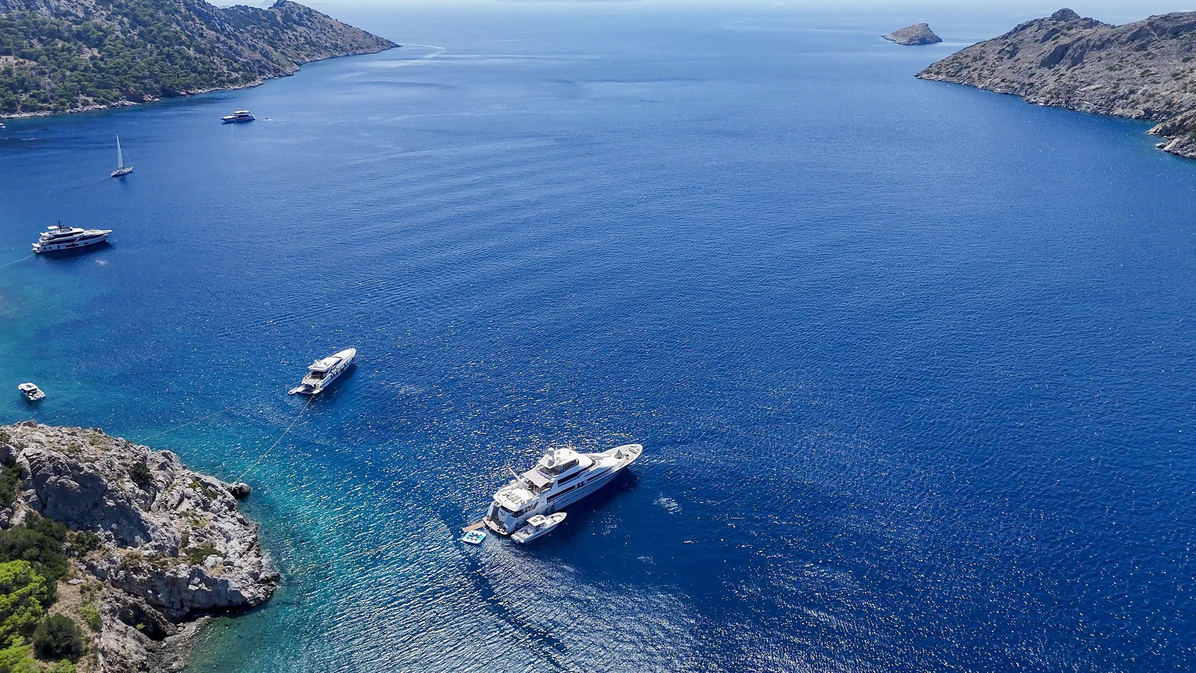 Liquid Rehab anchored in a wide bay