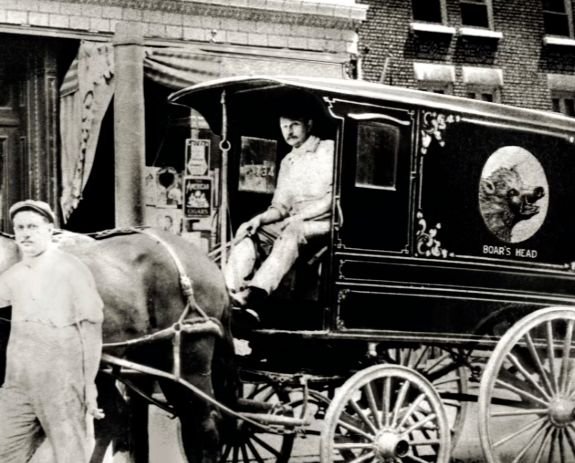 Vintage photo of a horse-drawn Boar’s Head delivery wagon