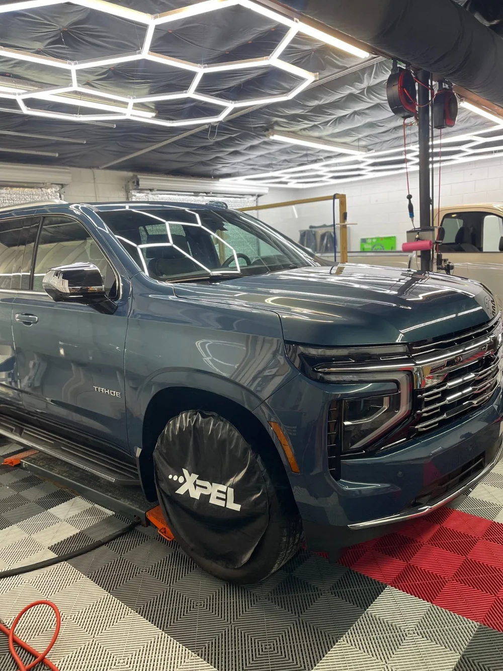 Chevrolet Tahoe: PPF install in the bay at OCD Tinting & Wraps, Fort Walton Beach