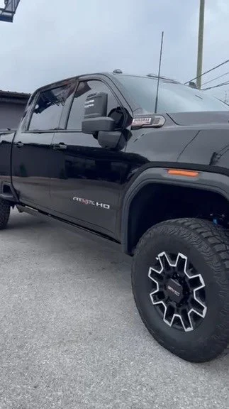 Black GMC Sierra AT4 with XPEL ceramic window tint at OCD Tinting & Wraps, Fort Walton Beach
