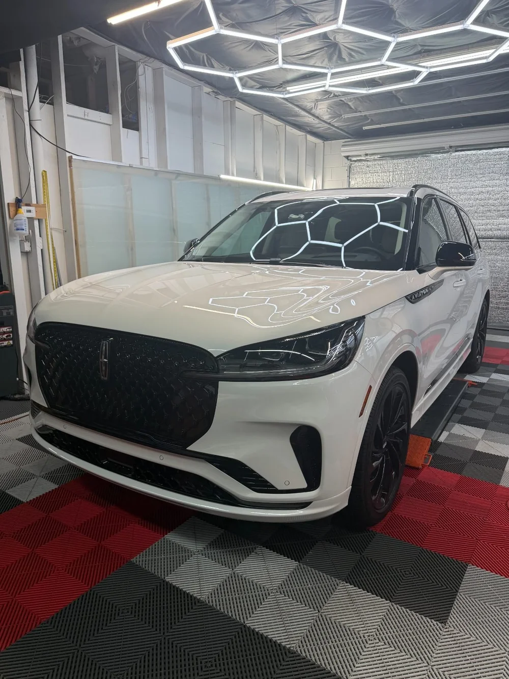 Under the lights: Final inspection at OCD Tinting & Wraps, Fort Walton Beach