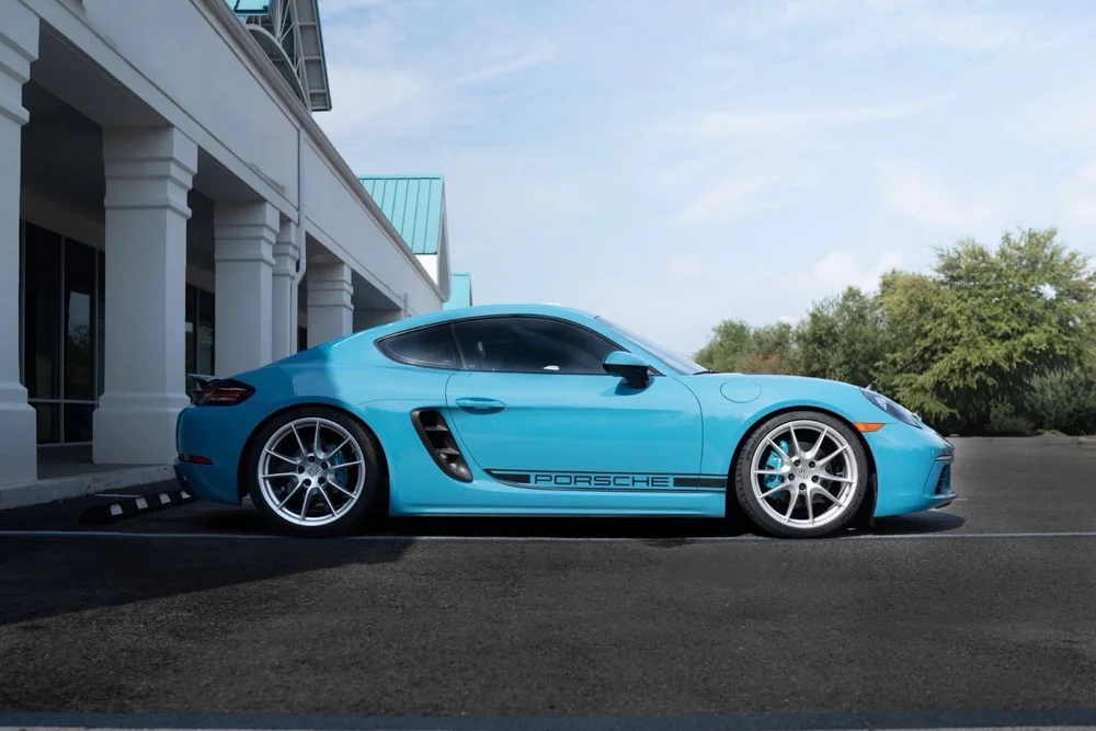Miami Blue Porsche 718 Cayman color-wrapped by OCD