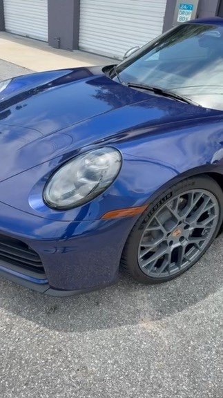 Blue Porsche 911 front fender with paint protection film at OCD Tinting & Wraps, Fort Walton Beach
