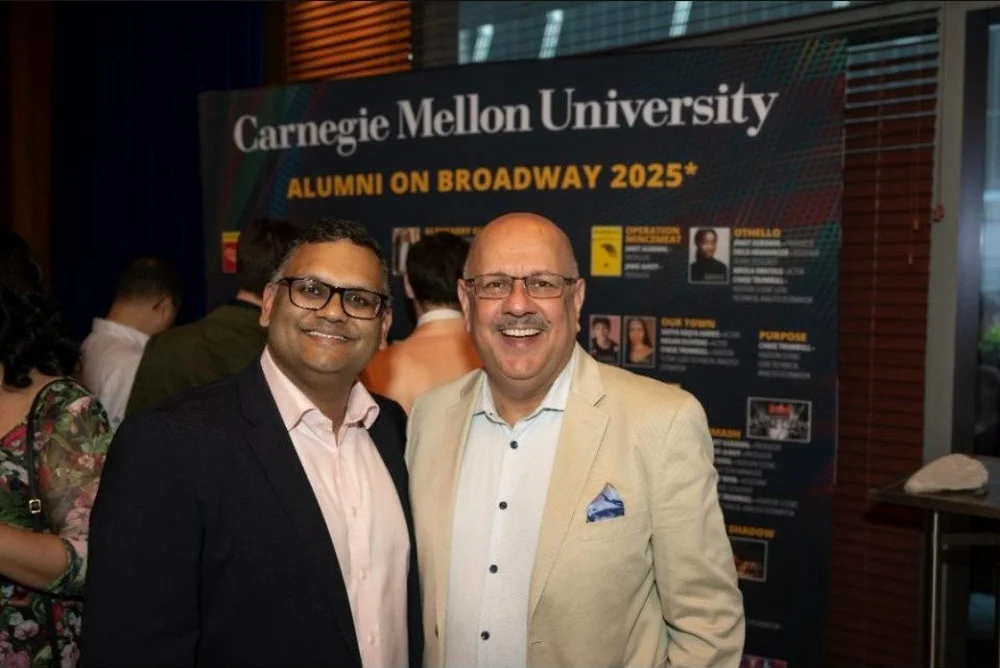 Ankit Agrawal with Carnegie Mellon University president Farnam Jahanian in front of the CMU Alumni on Broadway 2025 board